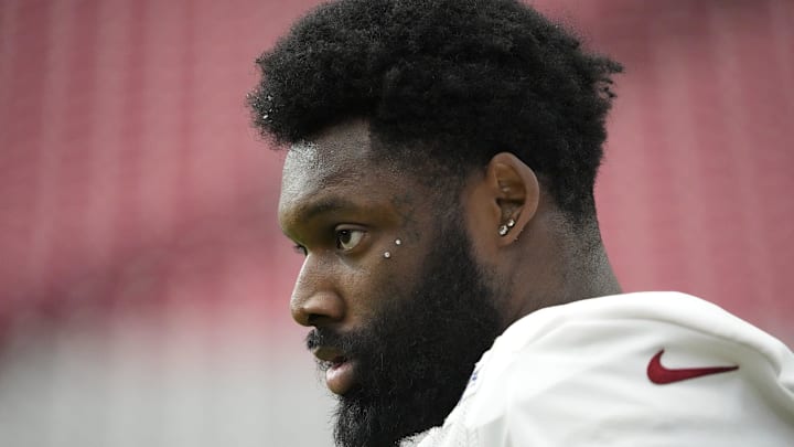 Arizona Cardinals linebacker Josh Sweat takes a break during training camp at State Farm Stadium in Glendale on July 28, 2025.