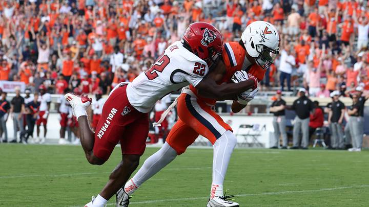 Aug 29, 2026; Charlottesville, Virginia, USA; Virginia Cavaliers wide receiver Da'Shawn Martin (18) scores a touchdown during the third quarter of the game against the North Carolina State Wolfpack at Scott Stadium. Mandatory Credit: Greg Atkins-Imagn Images Aug 29, 2026; Charlottesville, Virginia, USA; Virginia Cavaliers wide receiver Da'Shawn Martin (18) scores a touchdown during the third quarter of the game against the North Carolina State Wolfpack at Scott Stadium. Mandatory Credit: Greg Atkins-Imagn Images