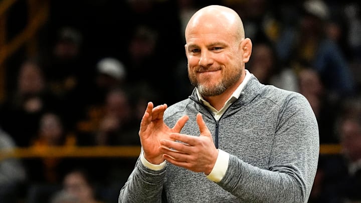 Penn State Nittany Lions wrestling coach Cael Sanderson reacts during a dual against the Iowa Hawkeyes at Carver-Hawkeye Arena. Penn State Nittany Lions wrestling coach Cael Sanderson reacts during a dual against the Iowa Hawkeyes at Carver-Hawkeye Arena.