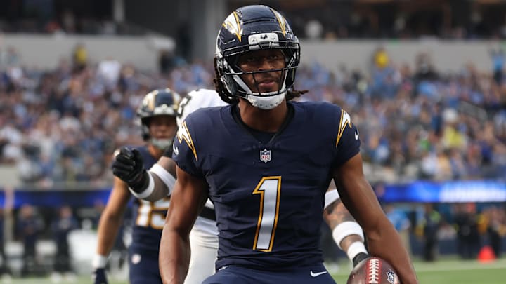 Nov 30, 2025; Inglewood, California, USA; Los Angeles Chargers wide receiver Quentin Johnston (1) reacts after scoring a touchdown against the Las Vegas Raiders during the first half at SoFi Stadium. Mandatory Credit: Kiyoshi Mio-Imagn Images