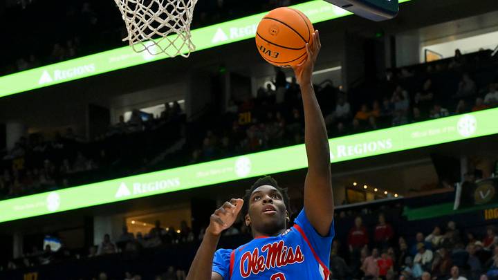 Mar 14, 2026; Nashville, TN, USA; Mississippi Rebels forward Malik Dia (0) lays the ball in Arkansas Razorbacks during the second half at Bridgestone Arena. Mar 14, 2026; Nashville, TN, USA; Mississippi Rebels forward Malik Dia (0) lays the ball in Arkansas Razorbacks during the second half at Bridgestone Arena.