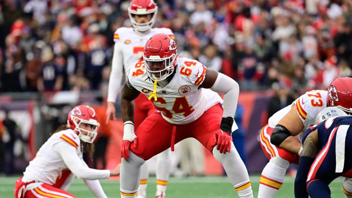 Dec 17, 2023; Foxborough, Massachusetts, USA; Kansas City Chiefs offensive tackle Wanya Morris (64) lines up in protection during the first half against the New England Patriots at Gillette Stadium. Mandatory Credit: Eric Canha-USA TODAY Sports