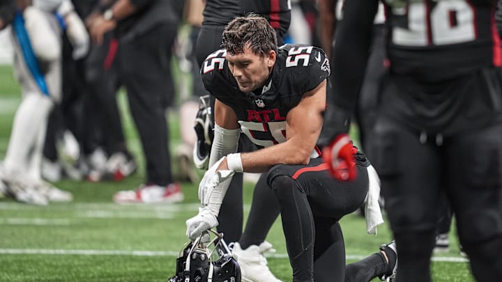 Jan 5, 2025; Atlanta, Georgia, USA; Atlanta Falcons linebacker Kaden Elliss (55) reacts on the field after the Falcons were defeated by the Carolina Panthers in overtime at Mercedes-Benz Stadium. Mandatory Credit: Dale Zanine-Imagn Images
