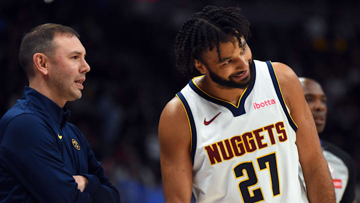 Oct 14, 2025; Denver, Colorado, USA; Denver Nuggets guard Jamal Murray (27) talks with head coach David Adelman during the first half against the Chicago Bulls at Ball Arena. Mandatory Credit: Christopher Hanewinckel-Imagn Images