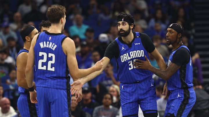 Orlando Magic center Goga Bitadze (35) is congratulated by forward Franz Wagner (22 )and teammates against the Charlotte Hornets during the first quarter at Kia Center. Orlando Magic center Goga Bitadze (35) is congratulated by forward Franz Wagner (22 )and teammates against the Charlotte Hornets during the first quarter at Kia Center.
