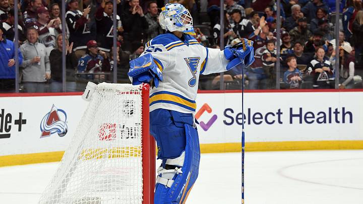 Oct 3, 2026; Denver, Colorado, USA; St. Louis Blues goalie Jordan Binnington (50) reacts after allowing a goal during the second period against the Colorado Avalanche at Ball Arena. Mandatory Credit: Christopher Hanewinckel-Imagn Images