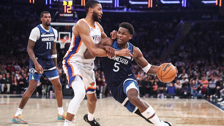 Minnesota Timberwolves guard Anthony Edwards looks to drive past New York Knicks forward Mikal Bridges in the first quarter at Madison Square Garden in New York on Jan. 17, 2025.