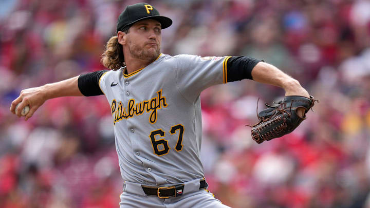 Pittsburgh Pirates relief pitcher Braxton Ashcraft (67) throws a pitch in the first inning of the MLB National League game between the Cincinnati Reds and the Pittsburgh Pirates at Great American Ball Park in downtown Cincinnati on Thursday, Sept. 25, 2025.