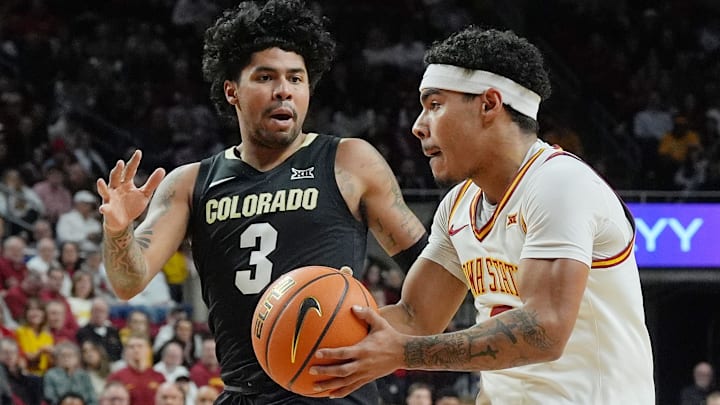 Iowa State Cyclones guard Tamin Lipsey (3) drives to the basket around Colorado Buffaloes guard Julian Hammond III (3) during the first half in the Big-12 men’s basketball at Hilton Coliseum on Feb.18, 2025 in Ames, Iowa.