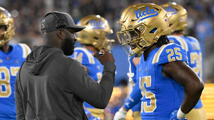 Sep 28, 2024; Pasadena, California, USA; UCLA Bruins head coach DeShaun Foster talks to Oregon Ducks at the Rose Bowl. Mandatory Credit: Robert Hanashiro-Imagn Images