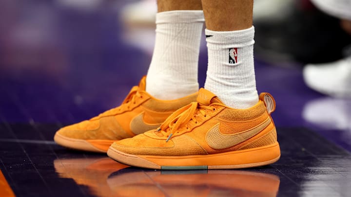 Dec 13, 2023; Phoenix, Arizona, USA; Detailed view of the Nike shoes of Phoenix Suns guard Devin Booker (1) against the Brooklyn Nets at Footprint Center. Mandatory Credit: Mark J. Rebilas-Imagn Images