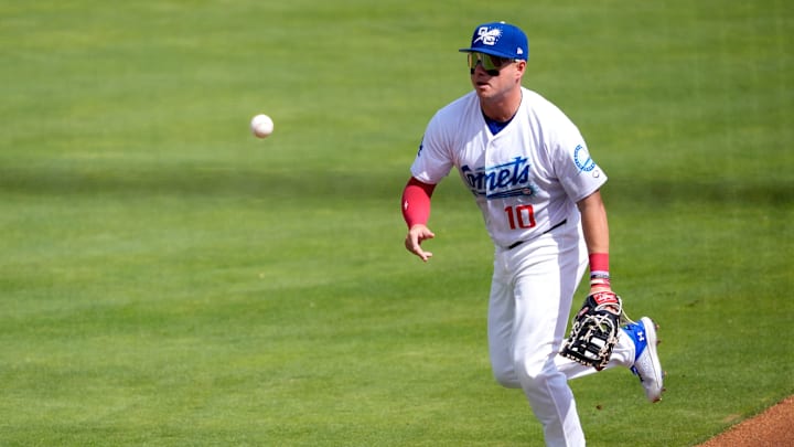 Oklahoma City's Ryan Ward (10) throws to first for an out during the minor league baseball between the Oklahoma City Comets and the Tacoma Rainers a the Chickasaw Bricktown Ballpark in Oklahoma City, Wednesday, April, 16, 2025. Oklahoma City's Ryan Ward (10) throws to first for an out during the minor league baseball between the Oklahoma City Comets and the Tacoma Rainers a the Chickasaw Bricktown Ballpark in Oklahoma City, Wednesday, April, 16, 2025.