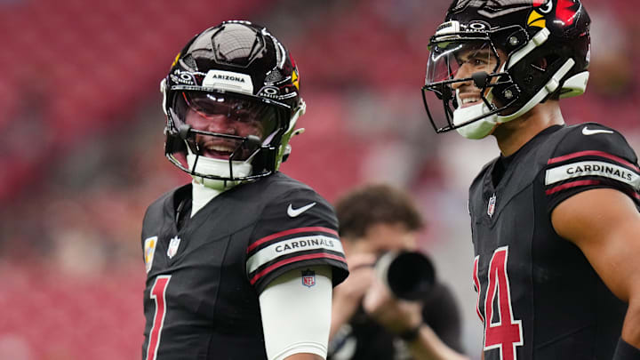 Arizona Cardinals quarterback Kyler Murray (1) chats with teammate Michael Wilson (14) before their game against the Tennessee Titans at State Farm Stadium in Glendale on Oct. 5, 2025.