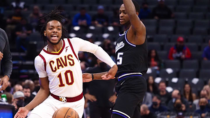 Jan 10, 2022; Sacramento, California, USA; Sacramento Kings guard De'Aaron Fox (5) fouls Cleveland Cavaliers guard Darius Garland (10) during the first quarter at Golden 1 Center. Mandatory Credit: Kelley L Cox-Imagn Images Jan 10, 2022; Sacramento, California, USA; Sacramento Kings guard De'Aaron Fox (5) fouls Cleveland Cavaliers guard Darius Garland (10) during the first quarter at Golden 1 Center. Mandatory Credit: Kelley L Cox-Imagn Images
