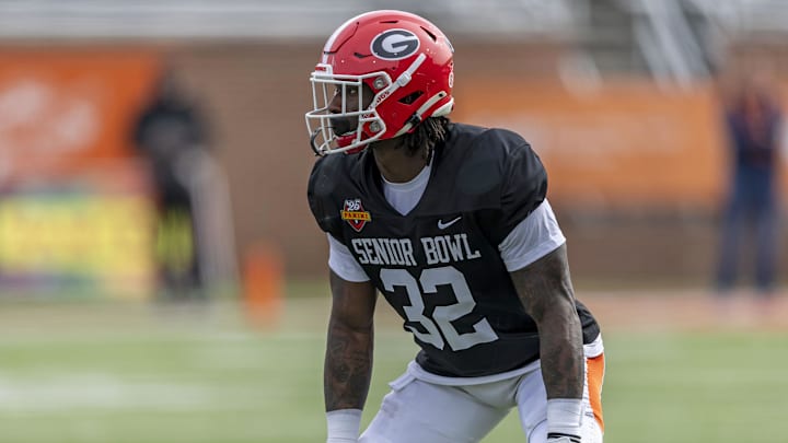 Jan 28, 2025; Mobile, AL, USA; American team linebacker Smael Mondon Jr. of Georgia (32) lines up during Senior Bowl practice for the American team at Hancock Whitney Stadium. Mandatory Credit: Vasha Hunt-Imagn Images