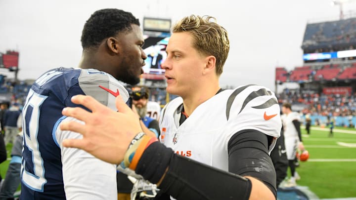 Dec 15, 2024; Nashville, Tennessee, USA; Cincinnati Bengals quarterback Joe Burrow (9) and Tennessee Titans defensive tackle Jeffery Simmons (98) during the second half at Nissan Stadium. Mandatory Credit: Steve Roberts-Imagn Images Dec 15, 2024; Nashville, Tennessee, USA; Cincinnati Bengals quarterback Joe Burrow (9) and Tennessee Titans defensive tackle Jeffery Simmons (98) during the second half at Nissan Stadium. Mandatory Credit: Steve Roberts-Imagn Images