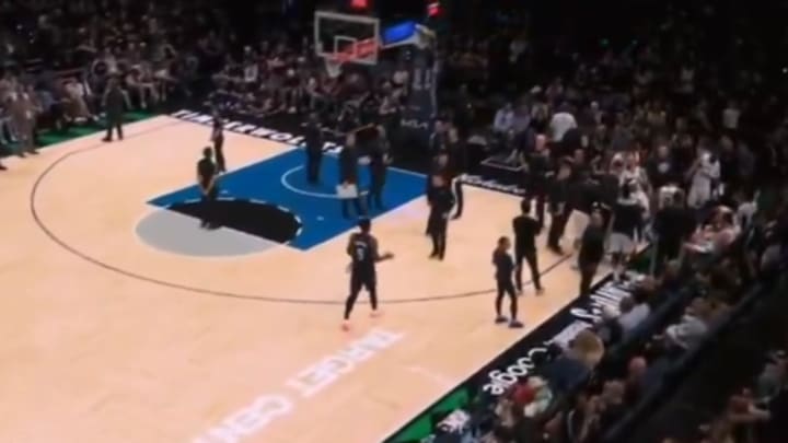 Anthony Edwards congratulating the Spurs midway through the fourth quarter.
