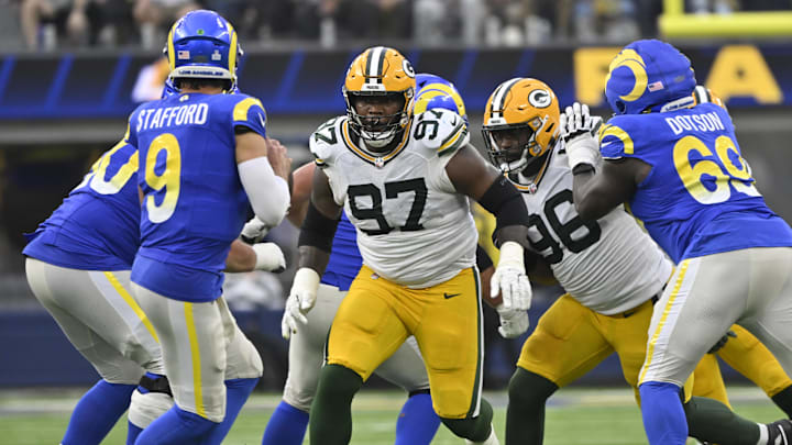 Green Bay Packers defensive tackles Kenny Clark and Colby Wooden