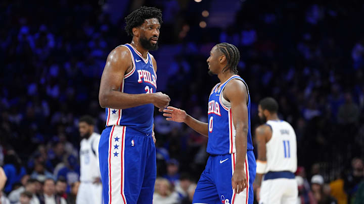 Feb 4, 2025; Philadelphia, Pennsylvania, USA; Philadelphia 76ers center Joel Embiid (21) reacts with guard Tyrese Maxey (0) against the Dallas Mavericks in the second quarter at Wells Fargo Center. Mandatory Credit: Kyle Ross-Imagn Images Feb 4, 2025; Philadelphia, Pennsylvania, USA; Philadelphia 76ers center Joel Embiid (21) reacts with guard Tyrese Maxey (0) against the Dallas Mavericks in the second quarter at Wells Fargo Center. Mandatory Credit: Kyle Ross-Imagn Images