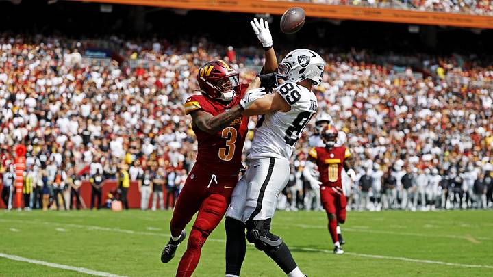 Sep 21, 2025; Landover, Maryland, USA; Washington Commanders safety Will Harris (3) breaks up a pass intended for Las Vegas Raiders tight end Brock Bowers (89) during the first half at Northwest Stadium. Mandatory Credit: Geoff Burke-Imagn Images