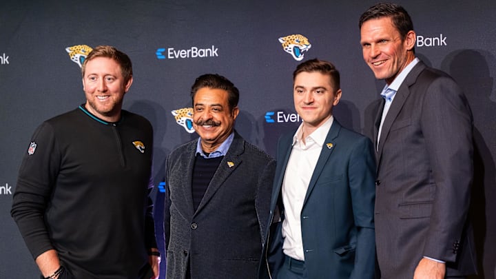 Jacksonville Jaguars Head Coach Liam Coen, left, Owner Shad Khan, second from left, new General Manager James Gladstone, second from right and Executive Vice President of Football Operations Tony Boselli, right, pose for a picture during a press conference Monday morning February 24, 2025 at the Miller Electric Center in Jacksonville, Fla. [Doug Engle/Florida Times-Union]2025