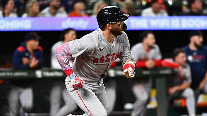Aug 26, 2025; Baltimore, Maryland, USA; Boston Red Sox shortstop Trevor Story (10) singles during the ninth inning against the Baltimore Orioles at Oriole Park at Camden Yards. Mandatory Credit: James A. Pittman-Imagn Images