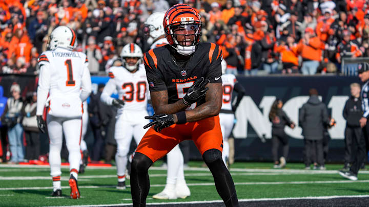 Cincinnati Bengals wide receiver Tee Higgins (5) celebrates a touchdown reception in the first quarter of the NFL Week 16 game between the Cincinnati Bengals and the Cleveland Browns at Paycor Stadium in downtown Cincinnati on Sunday, Dec. 22, 2024. The Bengals led 17-0 at halftime.