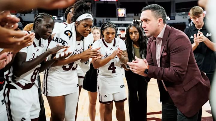 Mississippi State Head Coach Sam Purcell, Mississippi State Guard Awa Fane (#8), Mississippi State Forward Kharyssa Richardson (#33), Mississippi State Guard Trayanna Crisp (#4) and Mississippi State Assistant Women's Basketball Coach Samantha Williams during the game between the Mississippi Valley State Devilettes and the Mississippi State Bulldogs at Humphrey Coliseum in Starkville, MS. Mississippi State Head Coach Sam Purcell, Mississippi State Guard Awa Fane (#8), Mississippi State Forward Kharyssa Richardson (#33), Mississippi State Guard Trayanna Crisp (#4) and Mississippi State Assistant Women's Basketball Coach Samantha Williams during the game between the Mississippi Valley State Devilettes and the Mississippi State Bulldogs at Humphrey Coliseum in Starkville, MS.