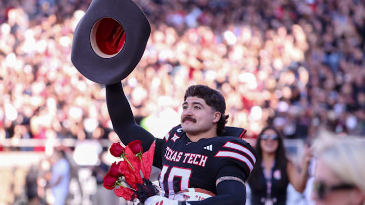 Texas Tech LB Jacob Rodriguez acknowledges the crowd after being honored on senior day.