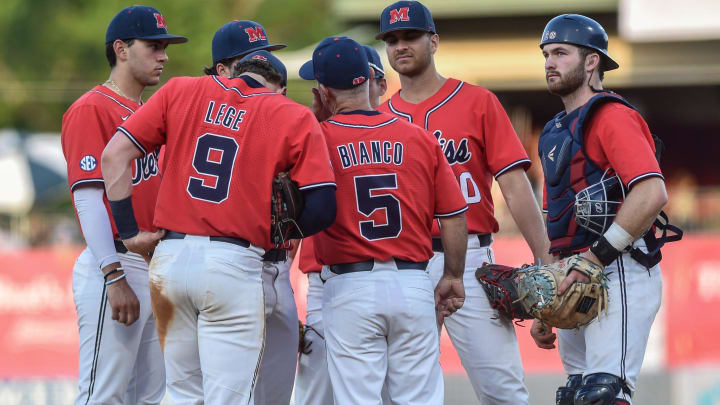 Head coach Mike Bianco (5) huddles with his players during the Ole Miss vs. Mississippi State Governor's Cup baseball game at Trustmark Park in Pearl, Miss., Tuesday, April 25, 2023.

TCL OleMissvMSU205