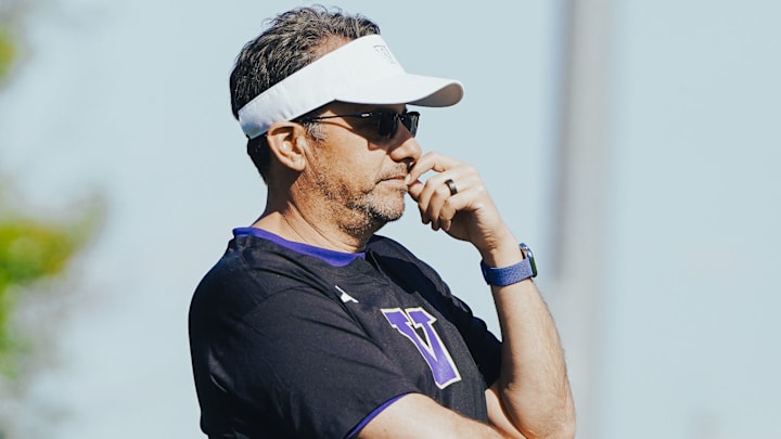 Jedd Fisch watches spring practice unfold on the East field.