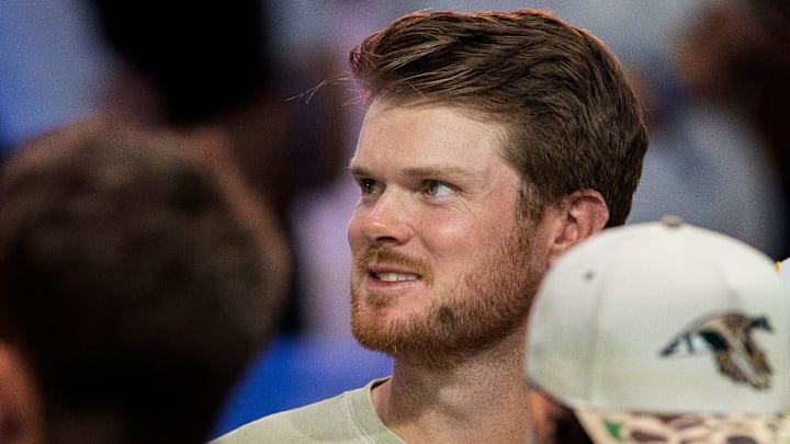 Minnesota Vikings quarterback Sam Darnold attends the TGL match between Jupiter Links GC and Atlanta Drive GC at SoFi Center on March 4, 2025, in Palm Beach Gardens, Florida.