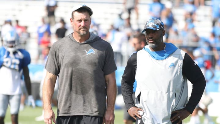 Lions head coach Dan Campbell and general manager Brad Holmes walk off the field during preseason Lions head coach Dan Campbell and general manager Brad Holmes walk off the field during preseason