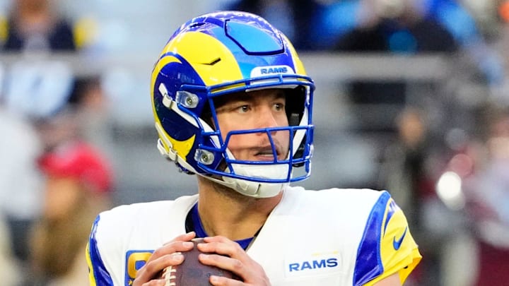 Los Angeles Rams quarterback Matthew Stafford (9) looks to pass against the Arizona Cardinals in the first half at State Farm Stadium on Dec 7, 2025, in Glendale, Ariz.