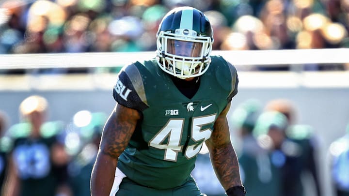 Nov 14, 2015; East Lansing, MI, USA; Michigan State Spartans linebacker Darien Harris (45) prepares for the snap of the ball during the 1st quarter of a game against the Maryland Terrapins at Spartan Stadium. Mandatory Credit: Mike Carter-Imagn Images Nov 14, 2015; East Lansing, MI, USA; Michigan State Spartans linebacker Darien Harris (45) prepares for the snap of the ball during the 1st quarter of a game against the Maryland Terrapins at Spartan Stadium. Mandatory Credit: Mike Carter-Imagn Images