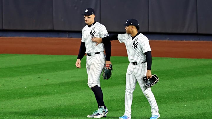 Oct 30, 2024; Bronx, New York, USA; New York Yankees outfielder Juan Soto (22) reacts with outfielder Aaron Judge (99) after Judge dropped a fly ball during the fifth inning against the Los Angeles Dodgers during game five of the 2024 MLB World Series at Yankee Stadium. Mandatory Credit: James Lang-Imagn Images Oct 30, 2024; Bronx, New York, USA; New York Yankees outfielder Juan Soto (22) reacts with outfielder Aaron Judge (99) after Judge dropped a fly ball during the fifth inning against the Los Angeles Dodgers during game five of the 2024 MLB World Series at Yankee Stadium. Mandatory Credit: James Lang-Imagn Images