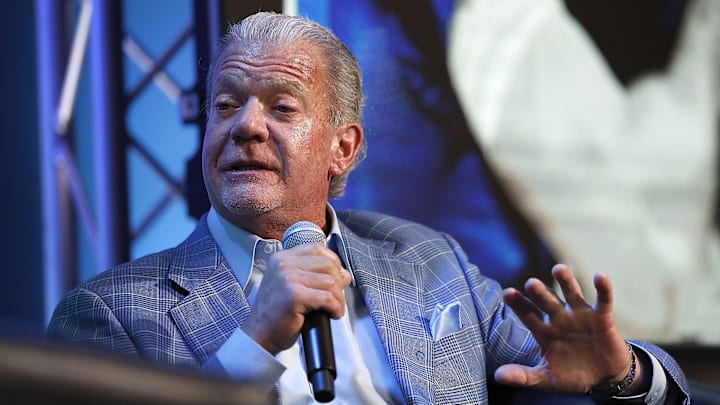 Colts owner Jim Irsay talks to Jeff Saturday during the Colts Town Hall Meeting with their fans and