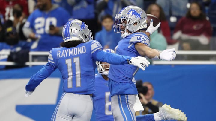 Detroit Lions wide receiver Amon-Ra St. Brown (14) celebrates his touchdown against the Arizona Cardinals with wide receiver Kalif Raymond (11) during the first half on Sunday, Dec. 19, 2021, at Ford Field in Detroit.

Lions Ariz