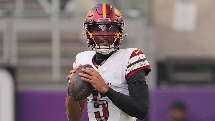 Dec 7, 2025; Minneapolis, Minnesota, USA; Washington Commanders quarterback Jayden Daniels (5) drops back to pass against the Minnesota Vikings during the first half at U.S. Bank Stadium. Mandatory Credit: Brad Rempel-Imagn Images Dec 7, 2025; Minneapolis, Minnesota, USA; Washington Commanders quarterback Jayden Daniels (5) drops back to pass against the Minnesota Vikings during the first half at U.S. Bank Stadium. Mandatory Credit: Brad Rempel-Imagn Images