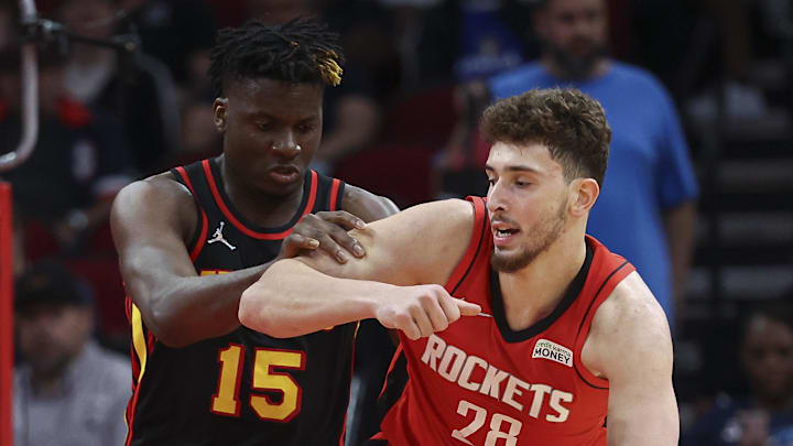 Apr 10, 2022; Houston, Texas, USA; Atlanta Hawks center Clint Capela (15) defends against Houston Rockets center Alperen Sengun (28) during the third quarter at Toyota Center. Mandatory Credit: Troy Taormina-Imagn Images Apr 10, 2022; Houston, Texas, USA; Atlanta Hawks center Clint Capela (15) defends against Houston Rockets center Alperen Sengun (28) during the third quarter at Toyota Center. Mandatory Credit: Troy Taormina-Imagn Images