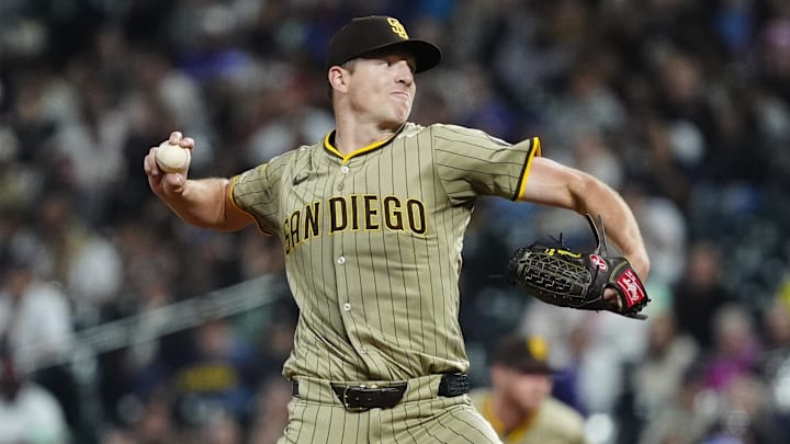 Sep 5, 2025; Denver, Colorado, USA; San Diego Padres starting pitcher Nick Pivetta (27) delivers a pitch in the fifth inning against the Colorado Rockies at Coors Field. Mandatory Credit: Ron Chenoy-Imagn Images