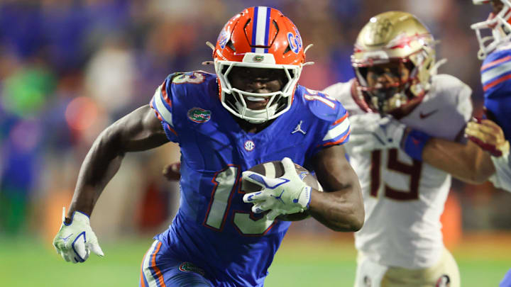 Florida running back Jadan Baugh (13) runs in for a touch down during the second half of an NCAA football game at Steve Spurrier Field at Ben Hill Griffin Stadium in Gainesville, FL on Saturday, November 29, Florida beat Florida State 40-21.2025. [Alan Youngblood/Gainesville Sun]