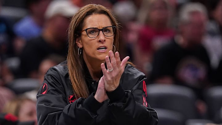 Indiana Fever head coach Stephanie White claps her hands in excitement Thursday, July 24, 2025, during the game at Gainbridge Fieldhouse in Indianapolis.
