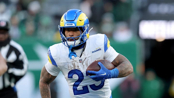 Dec 22, 2024; East Rutherford, New Jersey, USA; Los Angeles Rams running back Kyren Williams (23) runs with the ball against the New York Jets during the fourth quarter at MetLife Stadium. Mandatory Credit: Brad Penner-Imagn Images