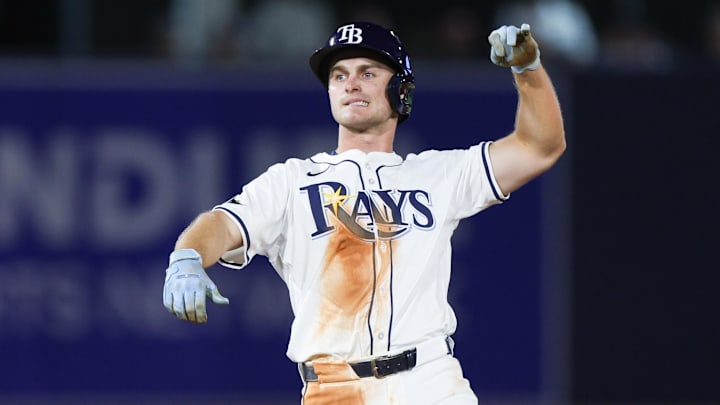Mar 31, 2025; St. Petersburg, Florida, USA; Tampa Bay Rays right fielder Jake Mangum (28) celebrates after hitting a double against the Pittsburgh Pirates in the sixth inning  at George M. Steinbrenner Field. Mandatory Credit: Nathan Ray Seebeck-Imagn Images