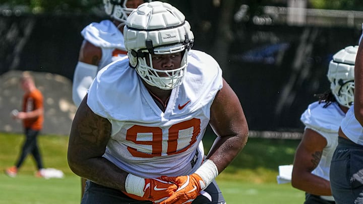 Sydir Mitchell (90) defensive lineman for the Texas Longhorns runs drills at practice at Frank Denius Fields on Thursday, Aug. 1, 2024 in Austin.