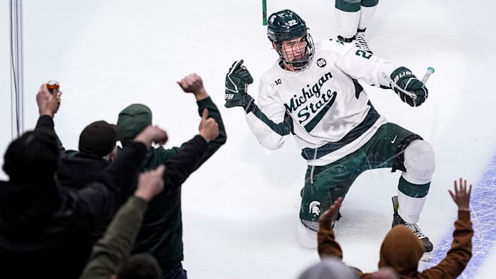 Michigan State forward Porter Martone (22) celebrates scoring a goal against Michigan during the first period of Duel in the D at Little Caesars Arena in Detroit on Saturday, February 7, 2026.