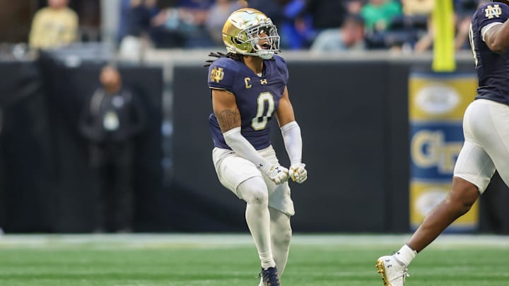 Oct 19, 2024; Atlanta, Georgia, USA; Notre Dame Fighting Irish safety Xavier Watts (0) celebrates after an interception against the Georgia Tech Yellow Jackets in the fourth quarter at Mercedes-Benz Stadium. Mandatory Credit: Brett Davis-Imagn Images
Oct 19, 2024; Atlanta, Georgia, USA; Notre Dame Fighting Irish safety Xavier Watts (0) celebrates after an interception against the Georgia Tech Yellow Jackets in the fourth quarter at Mercedes-Benz Stadium. Mandatory Credit: Brett Davis-Imagn Images