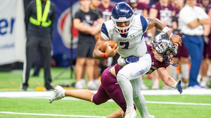 Knights quarterback Jujuan Johnson 7 runs the ball as St Thomas More takes on Lafayette Christian in the LHSAA State Football Championship. Saturday, Dec. 9, 2023.