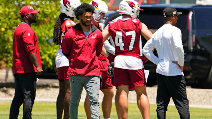 Arizona Cardinals quarterback Kyler Murray watches practice during organized team activities on June